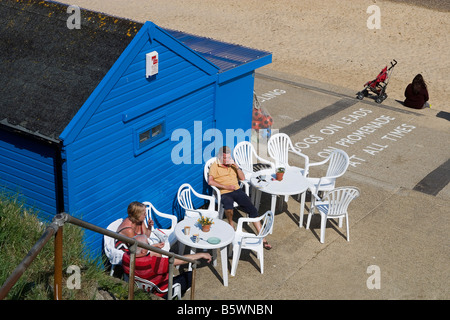 Southwold North Sea beach beach cottages Beach Huts Suffolk UK Stock Photo