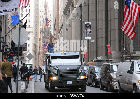 armored car driving on wall street near stock exchange manhattan new york city usa Stock Photo