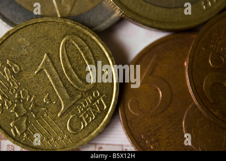 Close up of a 10 Euro cent piece with a 5 euro cent piece also visible Stock Photo