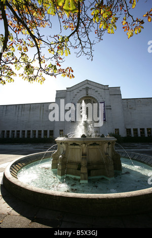 City of Southampton, England. Silhouetted view of the water fountain and Ernest Berry Webber designed Southampton Civic Centre. Stock Photo