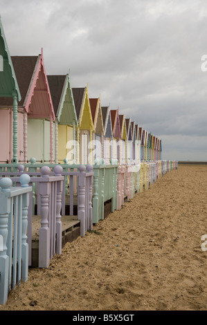 Pastel coloured beach huts at West Mersea, Essex on a cold winters day. Stock Photo