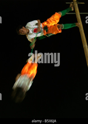 acrobatic stunt during the Vegetarian Festival in Phuket Thailand Stock Photo