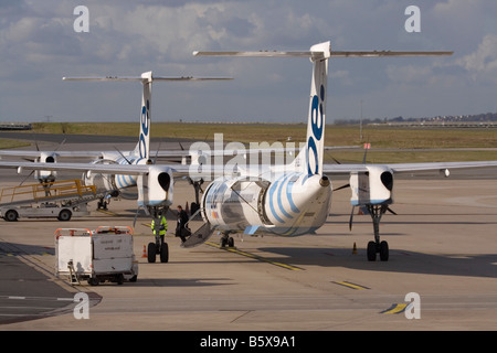Bombardier Dash 8-Q400 short haul airliners belonging to grounded British regional airline Flybe on the ground at Paris Charles de Gaulle airport. Stock Photo