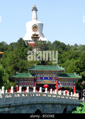 Bridge and entrance to the White Pagoda atop Jade Islet in the Beihai Park in Beijing. Beijing China Asia Stock Photo