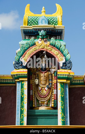 Hindu deity, Lord Venkateswara, painted statue, on the Lord Lakshmi Narasimha Swamy Temple in Kadiri, Andhra Pradesh, India Stock Photo