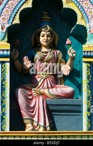 Hindu deity, painted statue, on the Lord Lakshmi Narasimha Swamy Temple in Kadiri, Andhra Pradesh, India Stock Photo