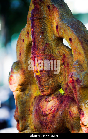 Hindu deity carved shrine stone statue, at the Lord Lakshmi Narasimha Swamy Temple in Kadiri, Andhra Pradesh, India Stock Photo