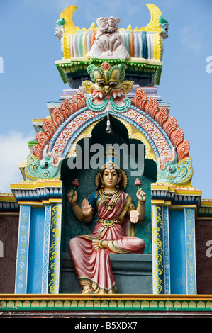 Hindu deity, painted statue, on the Lord Lakshmi Narasimha Swamy Temple in Kadiri, Andhra Pradesh, India Stock Photo