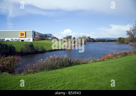 JCB Landscaped grounds with lake at Rocester Stock Photo - Alamy