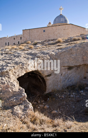 Church of Saint Serge and Saint Bacchus with cave dwelling in fo. Maalula, Rif-dimashq, Syria. Stock Photo