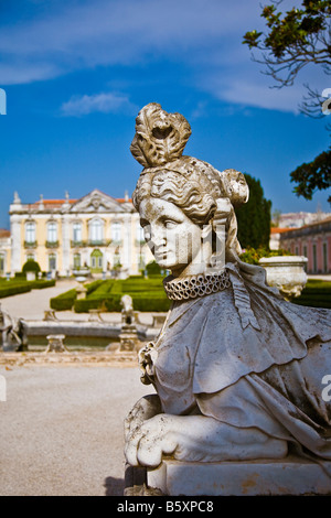 Dressed female Sphinx statue in the Neptune gardens/ Cerimonial Facade at Queluz Royal Palace Sintra, Portugal Stock Photo