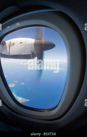 View from plane window over caribbean Stock Photo