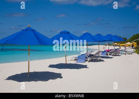 Umbellas on Shoal Bay East Beach on the caribbean island of Anguilla in the British West Indies Stock Photo