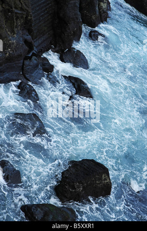 Water and rocks at the fishing harbour, porto de pesca, Capelas, São Miguel, Azores Stock Photo