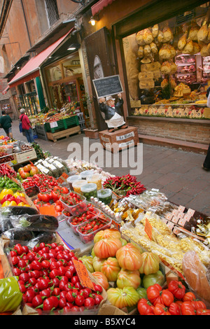 Fruit and vegetable stall and delicatessen, Via Clavature, Bologna, Italy Stock Photo
