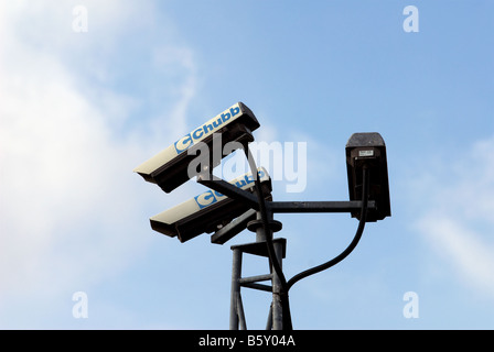 Chubb CCTV cameras monitoring a car park, Ipswich, Suffolk, UK. Stock Photo