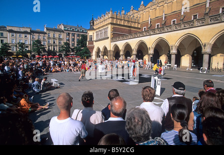 eastern europe poland krakow buskers in front of the cloth hall in market square Stock Photo