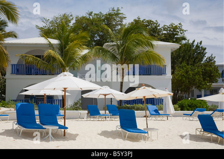 Umbellas  and chairs on Shoal Bay East Beach on the caribbean island of Anguilla in the British West Indies Stock Photo