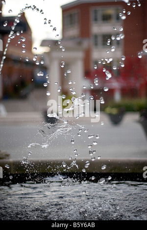 A closeup of some streams of water in a fountain as the droplets collide Stock Photo