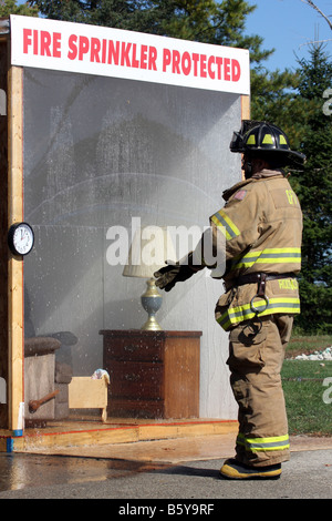 Firefighter in water under dangerous wier during drowning rescue ...