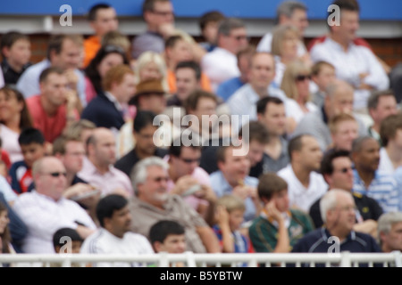 crowd fans spectaters blurred out of focus sports cricket soft background backdrop Stock Photo