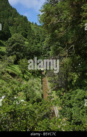 The tunnel through the vulcanic hillside for protection against flooding of the lake at Sete Cidades, São Miguel, Azores Stock Photo