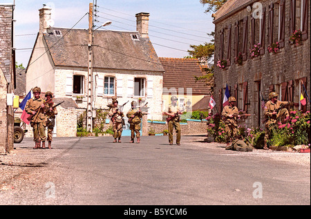 D Day re enactment U.S. 101st  airborne paratroopers liberation of village of Houesville Normandy France on the 8th June 1944 Stock Photo