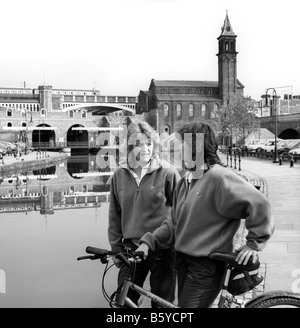 UK England Manchester city centre Castlefield Rangers patrolling Bridgewater Canal on bicycles Stock Photo