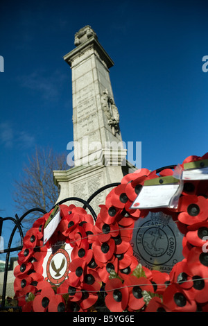 Poppy wreaths around the base of the War Memorial, Newmarket Suffolk UK