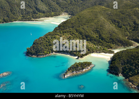 Mosquito Bay bottom right and Bark Bay top left Abel Tasman National Park Nelson Region South Island New Zealand aerial Stock Photo