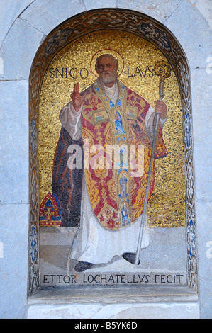 St Nicolaus mosaic on the west facade of Basilica dei San Marco, Venice, Italy. Stock Photo