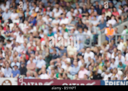 crowd fans spectaters blurred out of focus sports cricket soft background backdrop Stock Photo