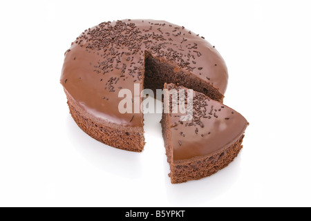 Sliced chocolate fudge cake isolated on white background Stock Photo