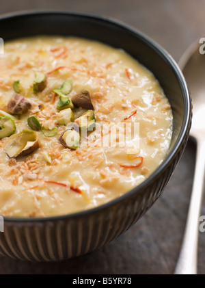 Saffron Pistachio and Coconut Rice Pudding Stock Photo