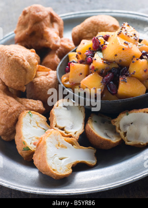 Pakoras- Mushroom and Cauliflower with Mango Mustard and Pomegranate Salad Stock Photo