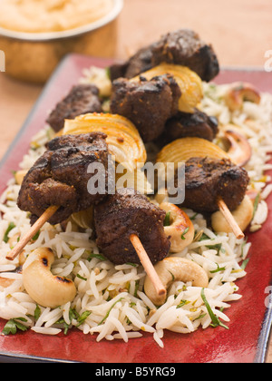 Cardamom Lamb Boti with Cashew Rice Stock Photo