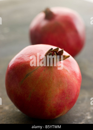Two Whole Pomegranates Stock Photo
