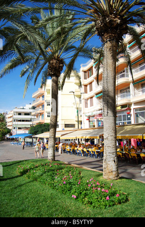 Beach promenade restaurants, Los Cristianos, Tenerife, Canary Islands, Spain Stock Photo