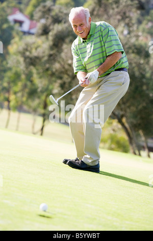 Man Playing A Game Of Golf Stock Photo