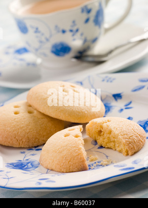 Wellington Button Biscuits with a Cup of Tea Stock Photo