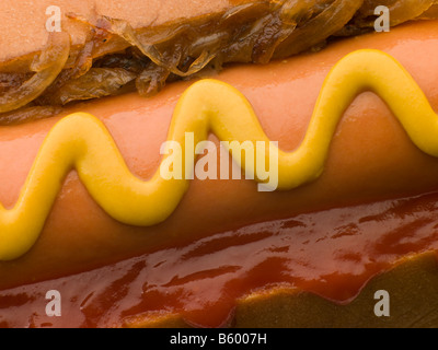 Hot Dog with Fried Onions mustard and Tomato Ketchup Stock Photo