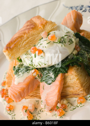 Seared Salmon Spinach and a Poached Egg in a Vol-au-Vent Case with a Dill and Keta Caviar Sauce Stock Photo