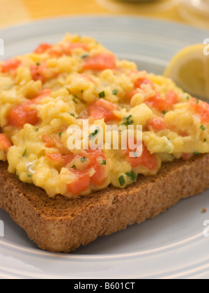 Scrambled Egg and Smoked Salmon on Brown Toast Stock Photo