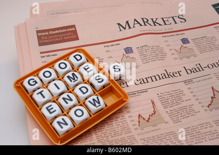 Game words arranged to state 'Good time ends now' on the markets page of the Financial Times news paper Stock Photo