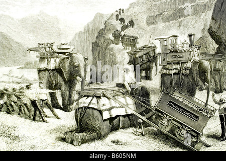 English army, India 1884. Transportation of portable railway 'Decauville' with elephants. Antique illustration. 1885. Stock Photo