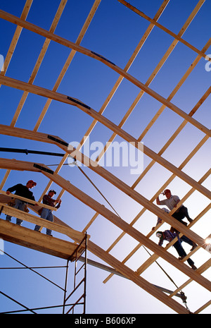 Neighbors volunteer their help to build a barn Pennsylvania Dutch Stock Photo