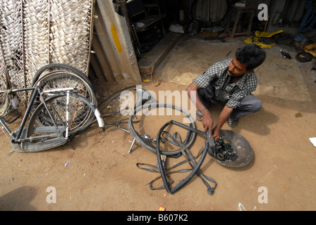 A CYCLE REPAIRING SHOP IN MADURAI TAMILNADU Stock Photo