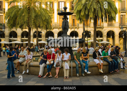 People at the fountain at Placa Reial in central Barcelona Spain Europe Stock Photo