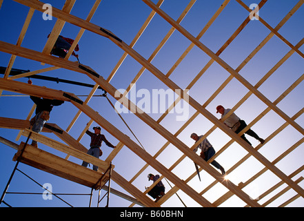 Neighbors volunteer their help to build a barn Pennsylvania Dutch Stock Photo