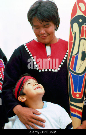 Native American Heiltsuk Indian Father and Son in Traditional Ceremonial Regalia Stock Photo